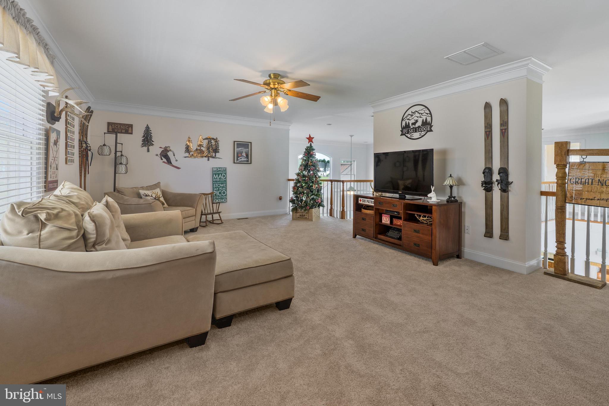 130 Augusta Drive Moorestown, NJ 08057 - Photo 17 of 36 a living room with furniture and a flat screen tv