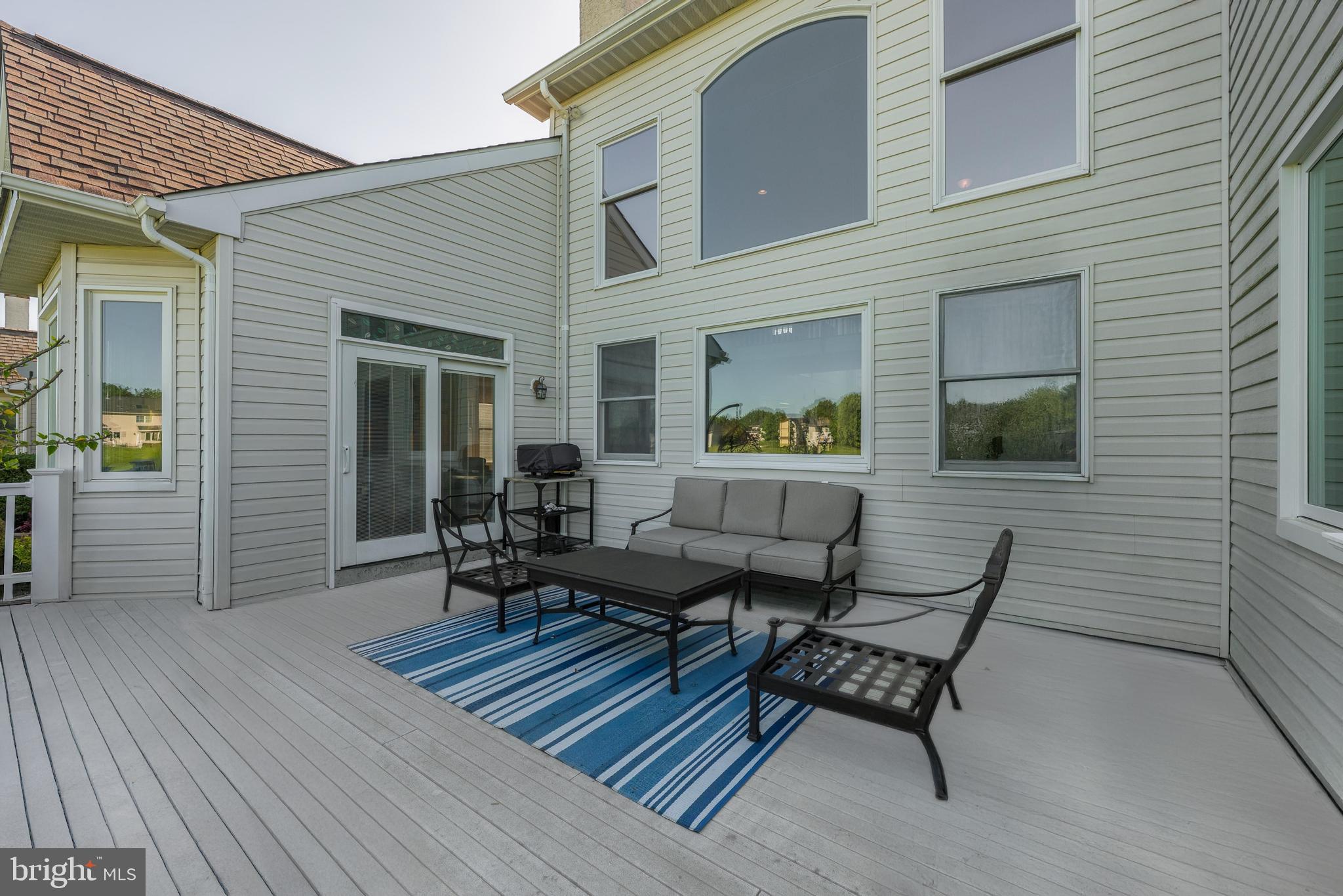 130 Augusta Drive Moorestown, NJ 08057 - Photo 26 of 36 a backyard of a house with seating space