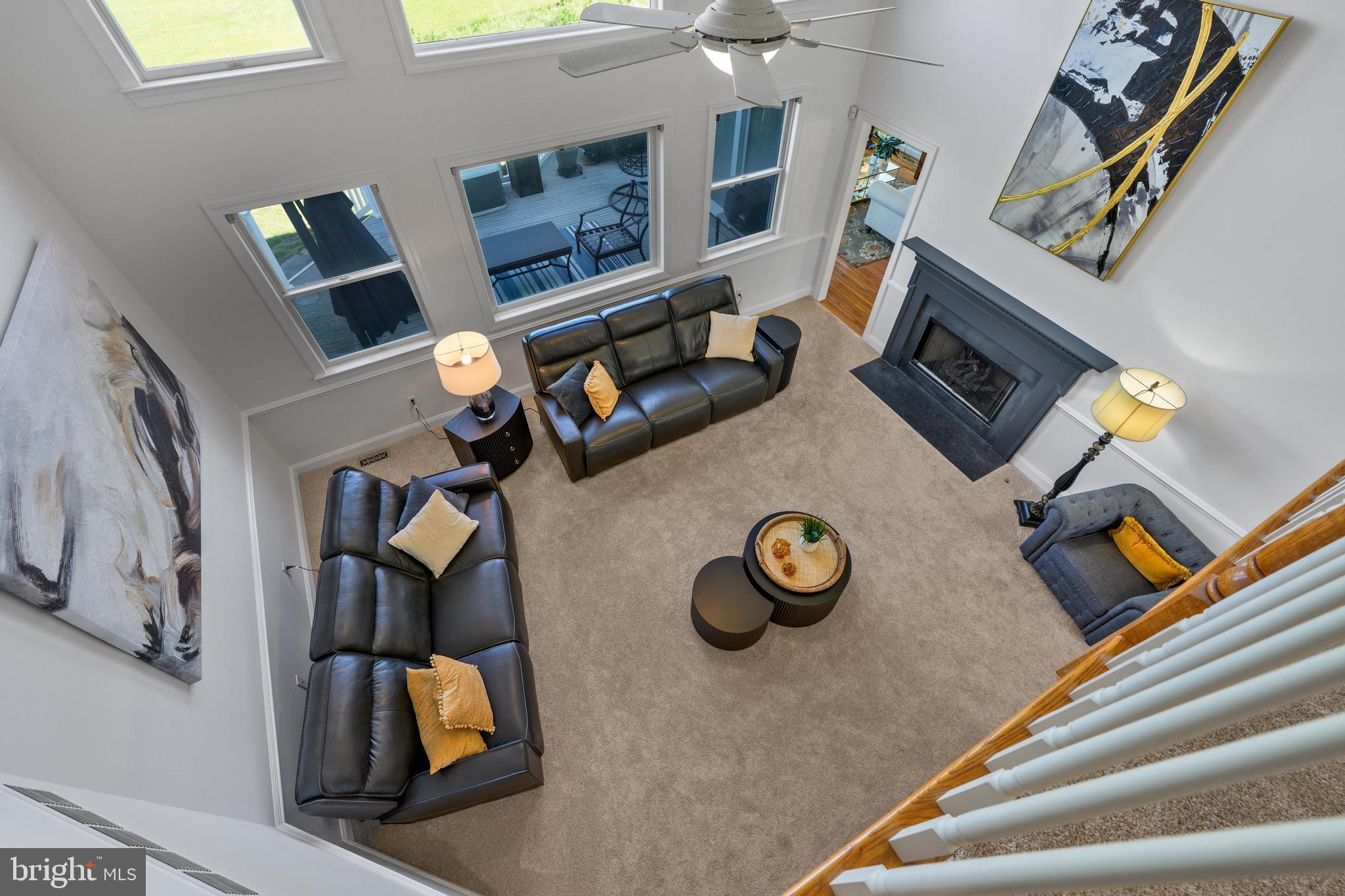 130 Augusta Drive Moorestown, NJ 08057 - Photo 7 of 36 a view of living room with furniture and a fireplace
