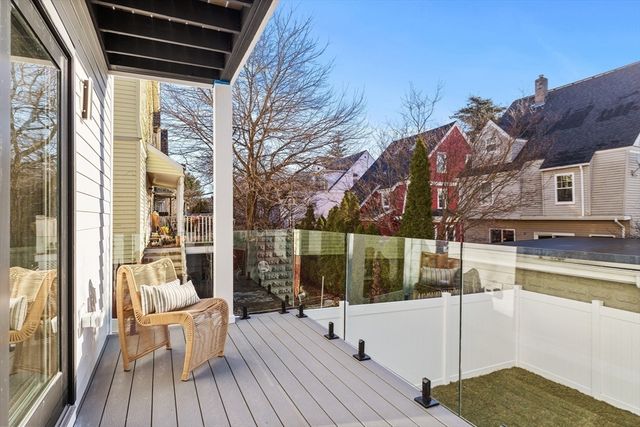 a view of entryway with stairs and wooden floor