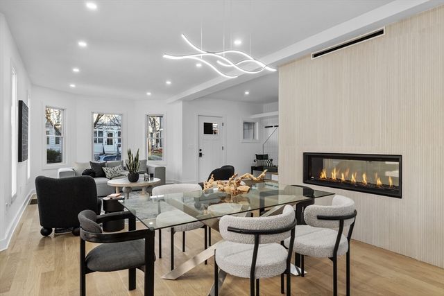 a view of hallway with wooden floor