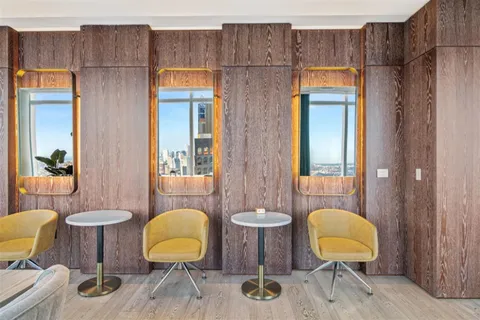 a room with furniture and a large window