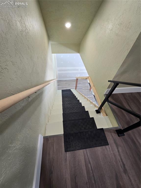 33036 Meadow Ridge Lane Trinidad, CO 81082 - Photo 45 of 50 Stairway featuring hardwood / wood-style flooring