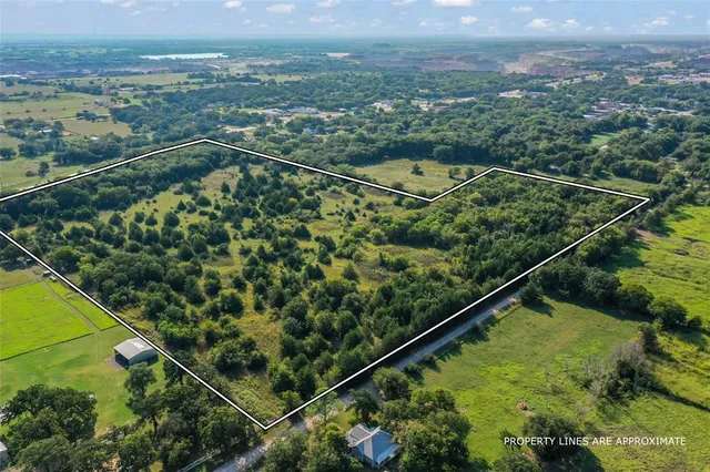 a view of a garden from a balcony