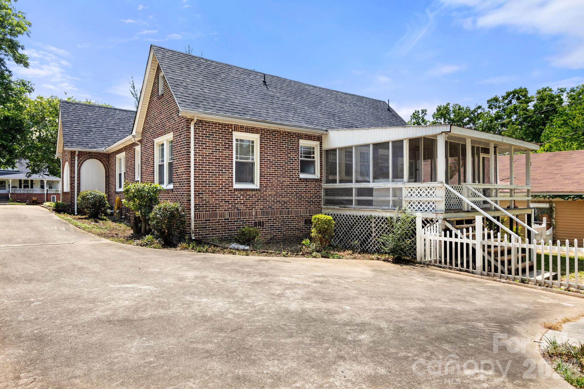 108 Reedy Street Chester, SC 29706 - Photo 35 of 42 a front view of a house with a yard