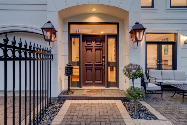 a front view of a house with a porch