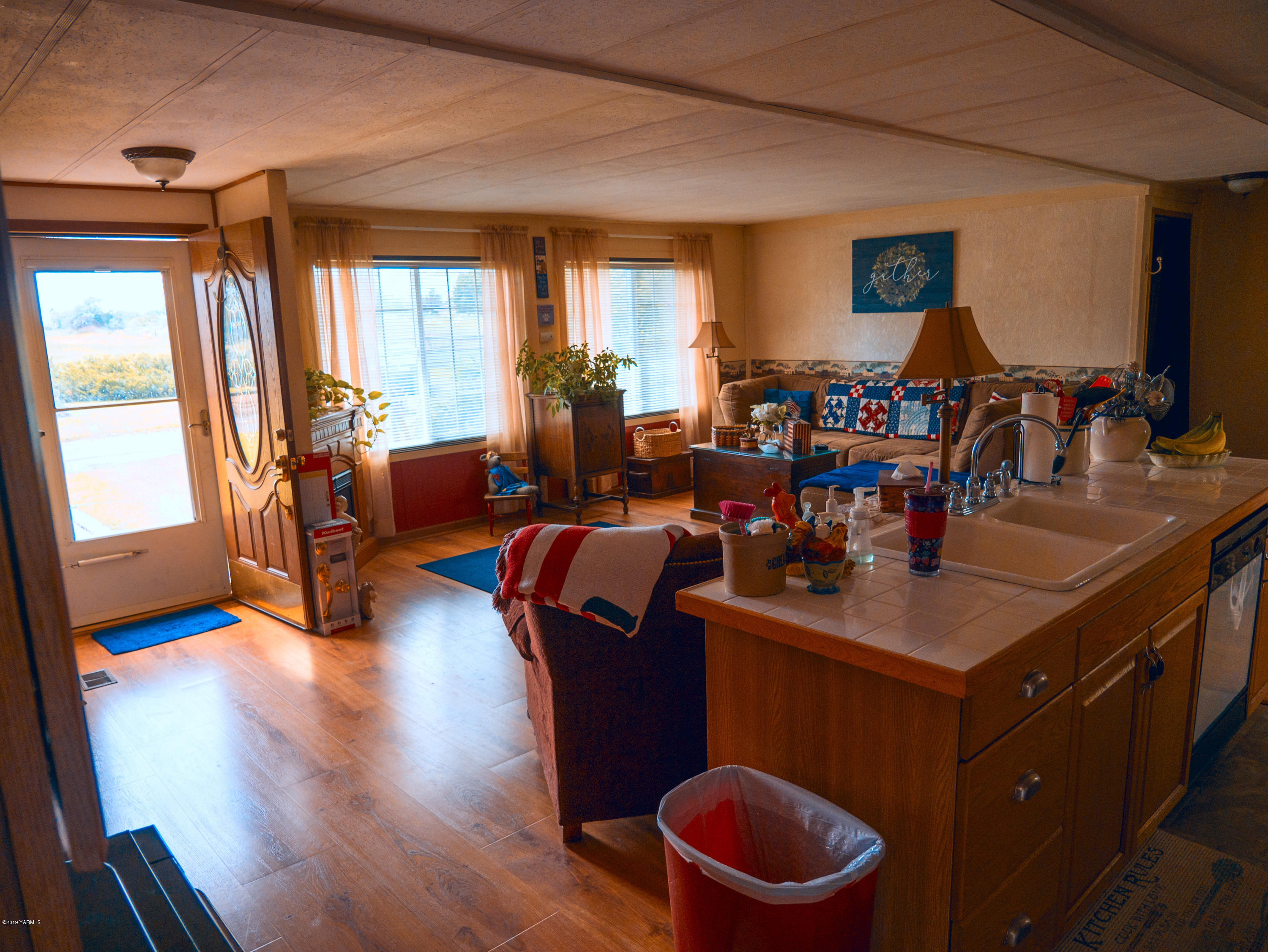 1001 Albro Road North Prosser, WA 99350 - Photo 10 of 19 a very nice looking living room with a large window and wooden floor