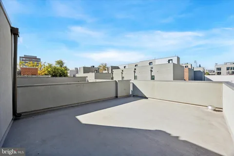 a view of a terrace with wooden floor