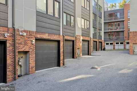 a view of a building with a street