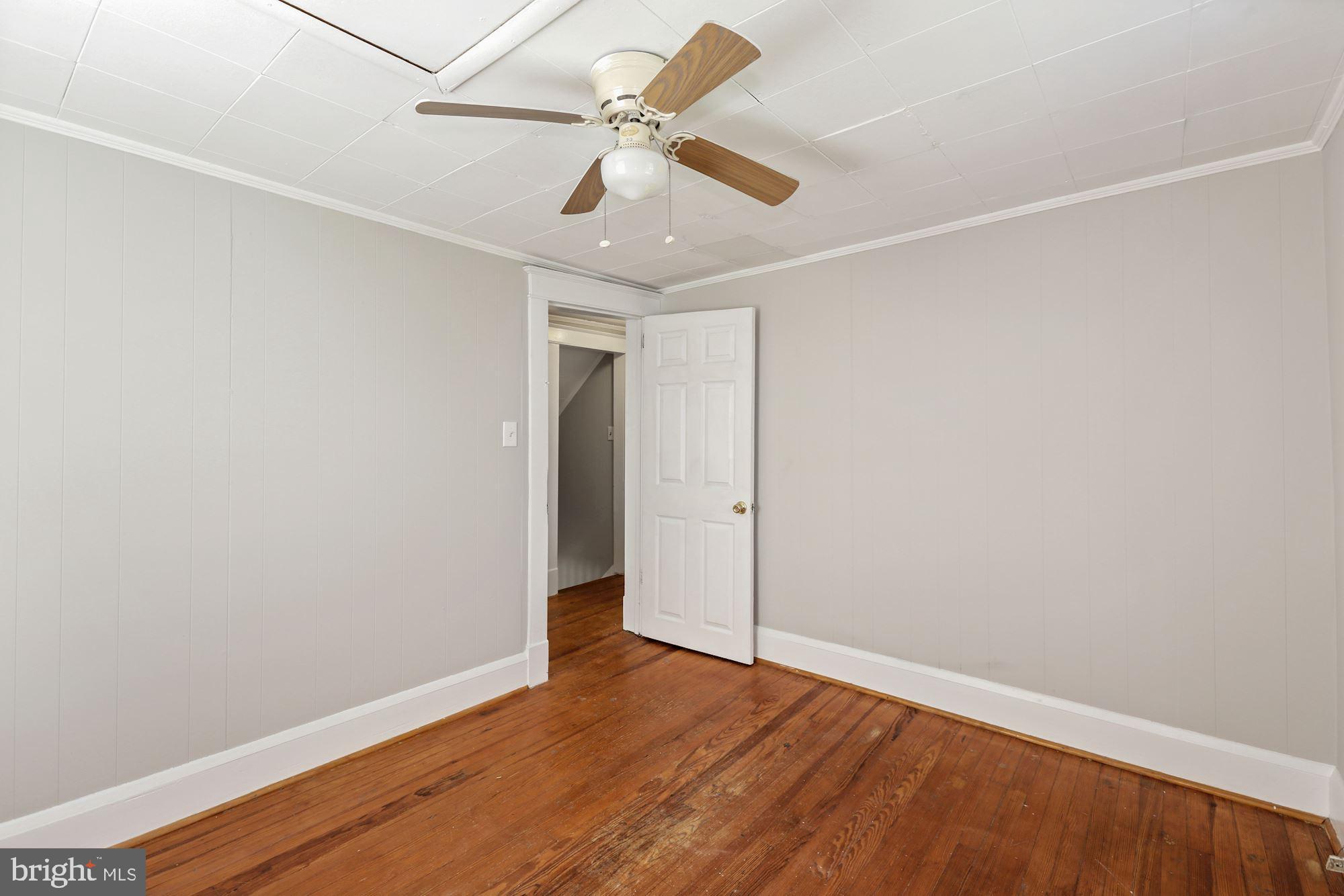 2710 Georgetown Road Baltimore, MD 21230 - Photo 16 of 29 Primary Bedroom | Hardwood Floors