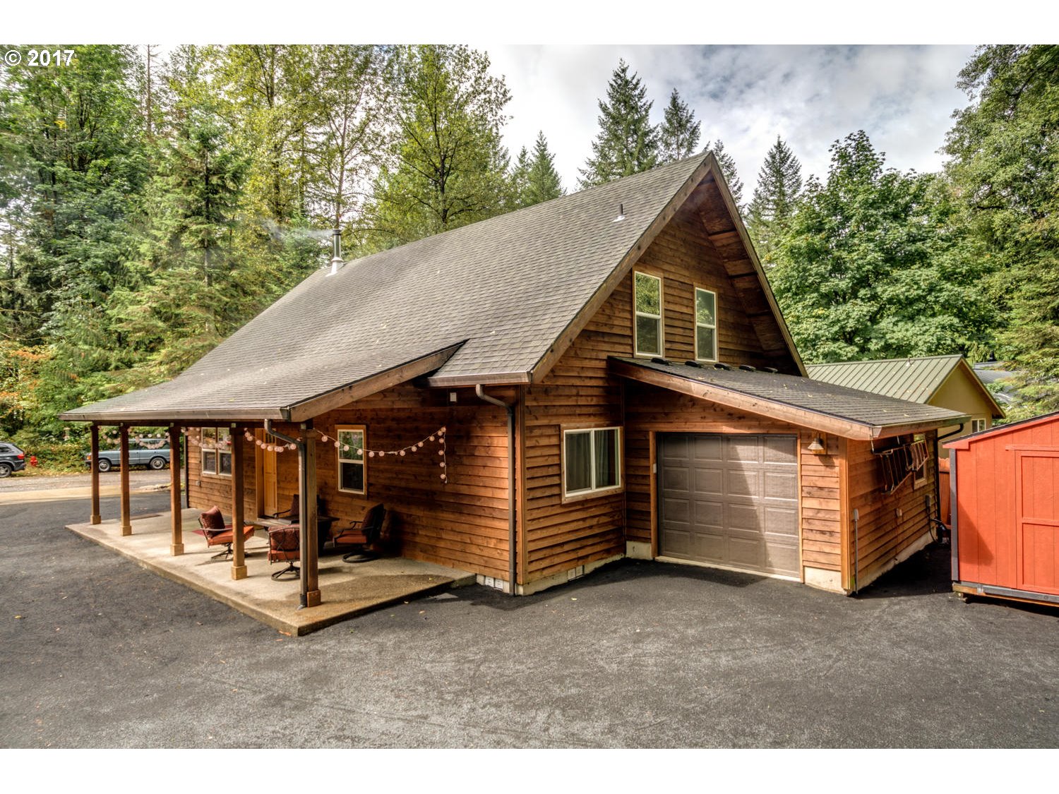 64877 East Pine Tree Way Rhododendron, OR 97049 - Photo 6 of 29 a view of a house with a yard