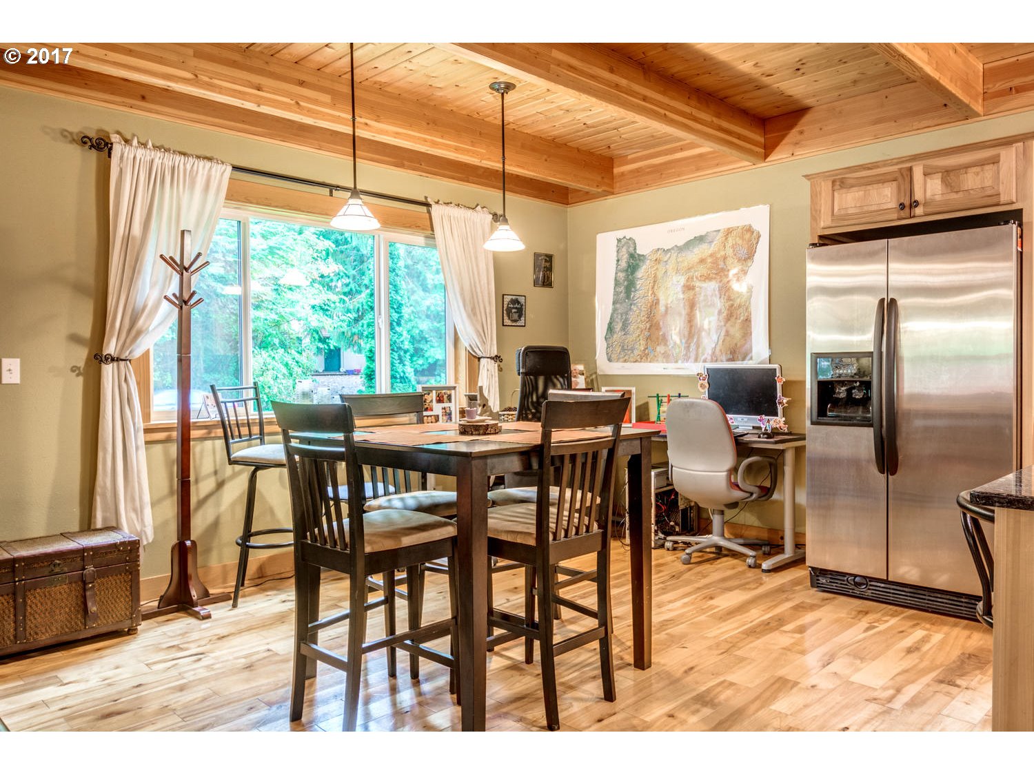 64877 East Pine Tree Way Rhododendron, OR 97049 - Photo 8 of 29 a view of a dining room with furniture window and outside view