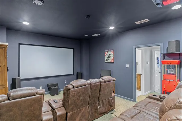 a bathroom with a shower toilet and sink