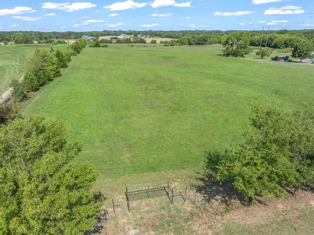 a view of a lake with a city