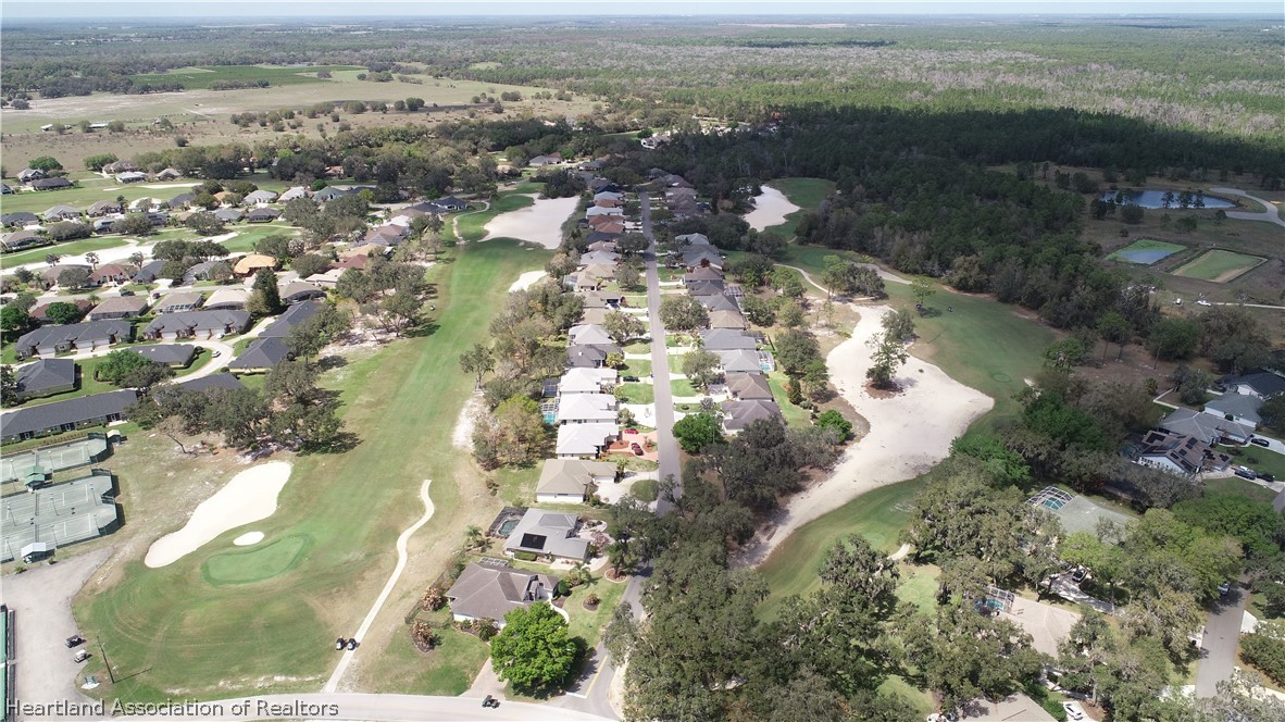 2737 Cheyenne Road Sebring, FL 33875 - Photo 49 of 50 an aerial view of residential houses with outdoor space