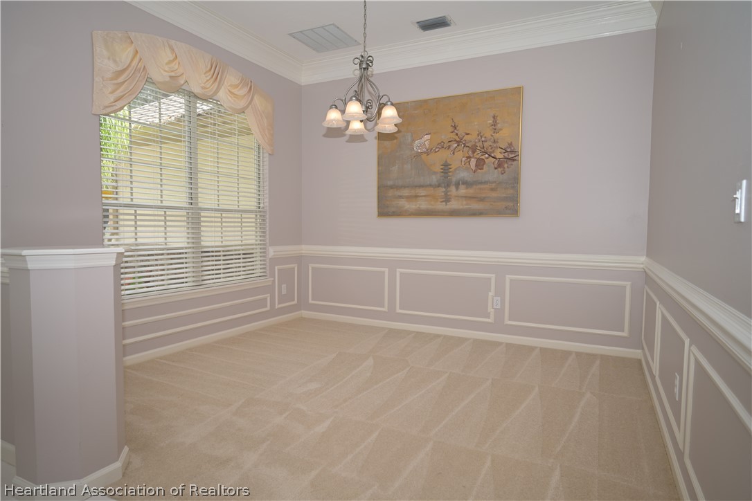 2737 Cheyenne Road Sebring, FL 33875 - Photo 5 of 50 a view of an empty room with a window