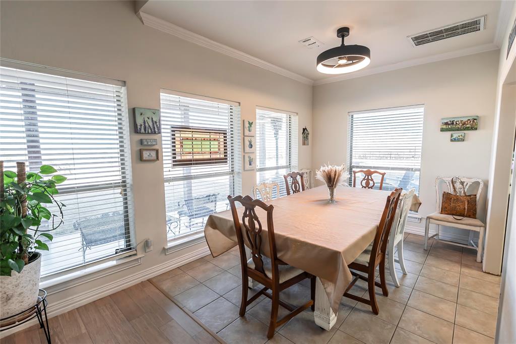 2168 Fruitland Road Sunset, TX 76270 - Photo 24 of 40 a dining room with furniture and window