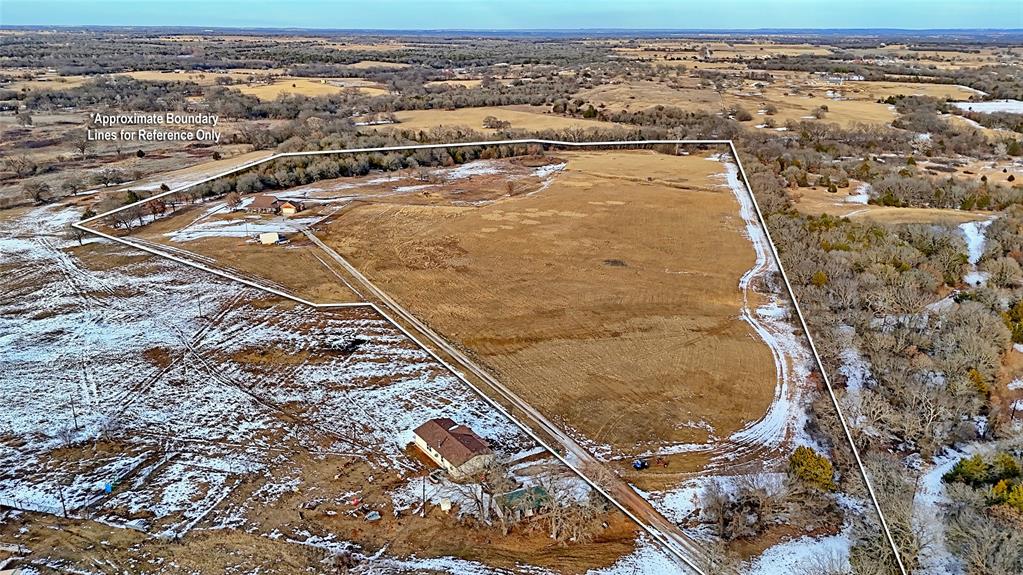 2168 Fruitland Road Sunset, TX 76270 - Photo 40 of 40 an aerial view of residential houses with outdoor space