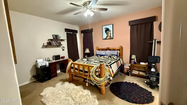 a bathroom with a sink a mirror a bathtub and shower