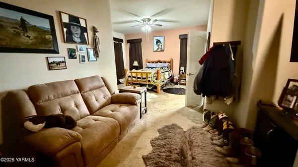a view of a living room with furniture