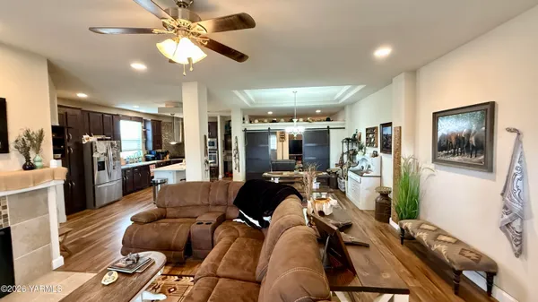 a view of a hallway with wooden shelves