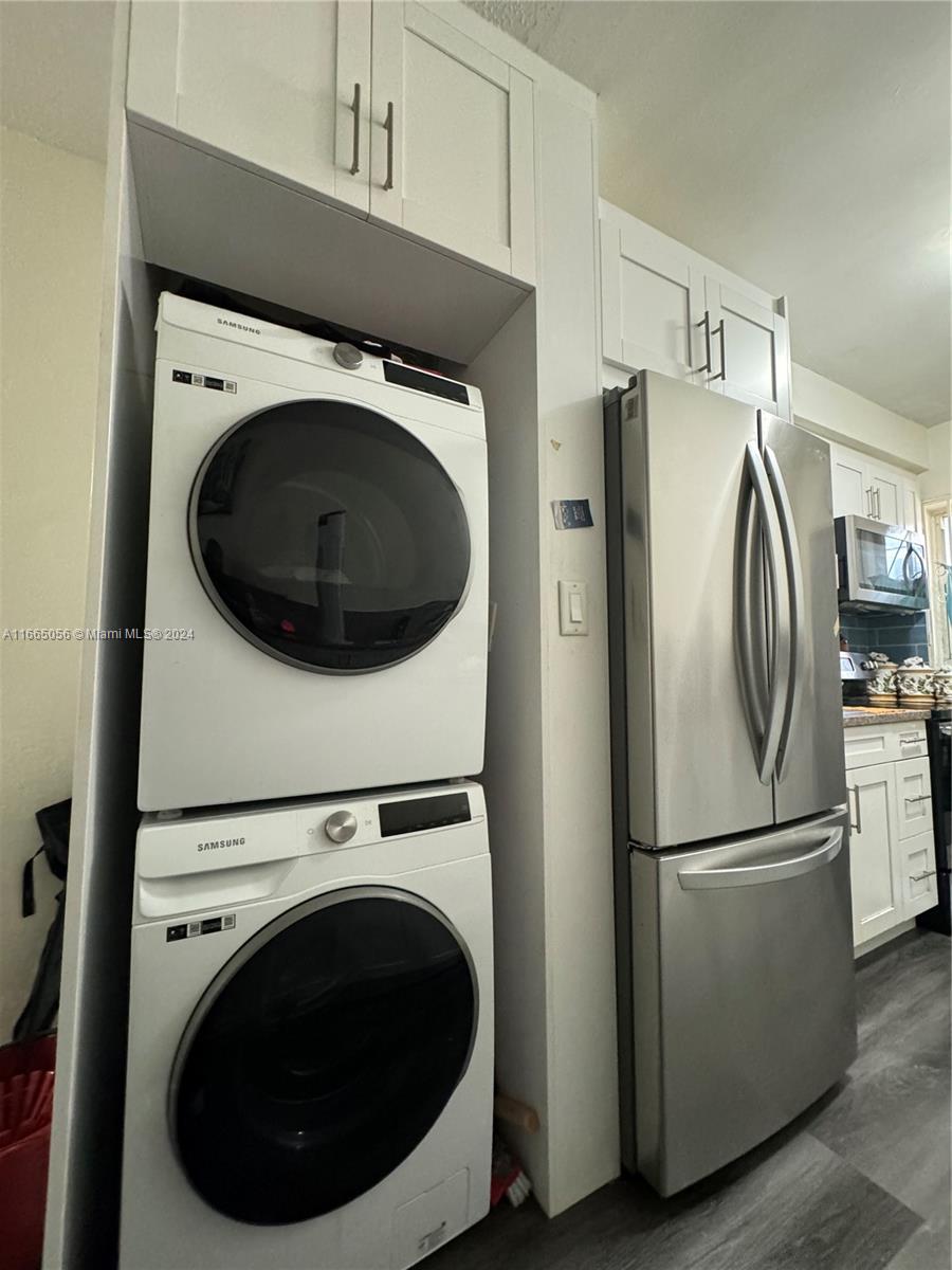 3551 Southwest 10th Street, Unit 8A Miami, FL 33135 - Photo 5 of 10 a utility room with dryer and washer