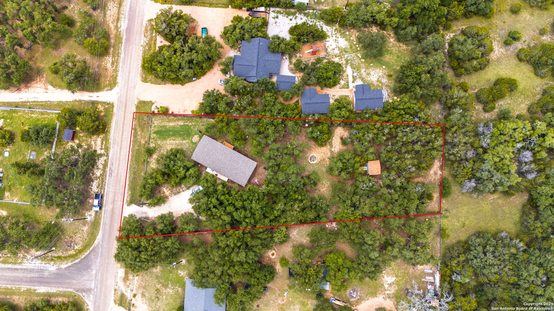 461 Rust Ranch Road Blanco, TX 78606 - Photo 1 of 1 a view of a yard with plants