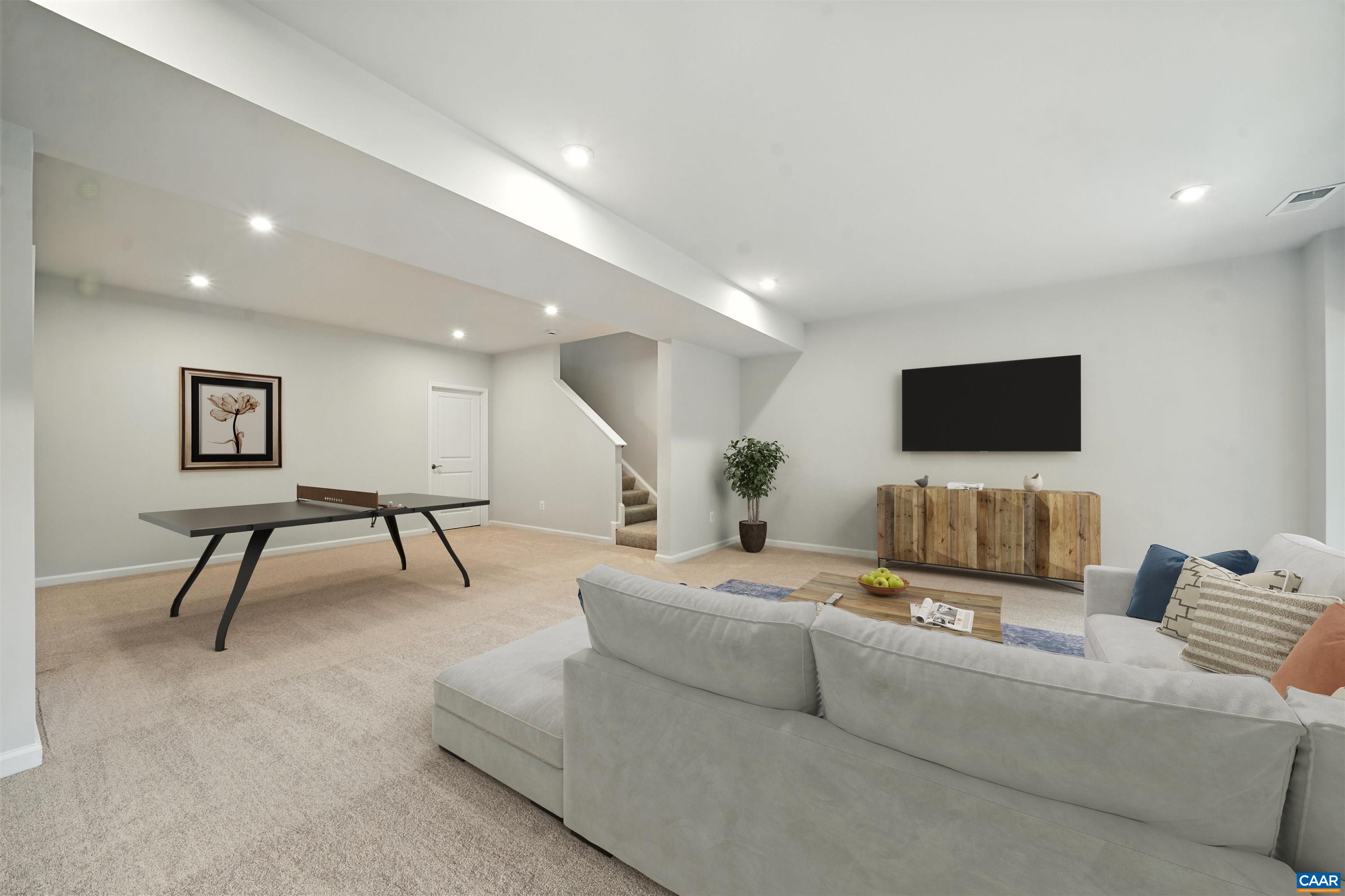 3071 Rambling Brk Lane Crozet, VA 22932 - Photo 18 of 38 a living room with furniture and a flat screen tv