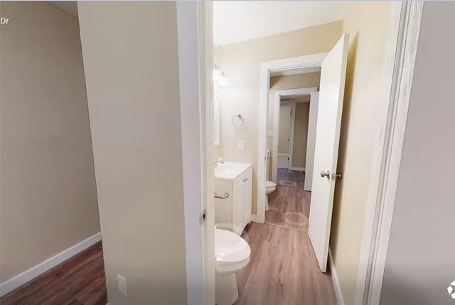 a bathroom with a toilet and a sink