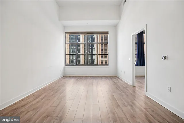 a view of kitchen with wooden floor