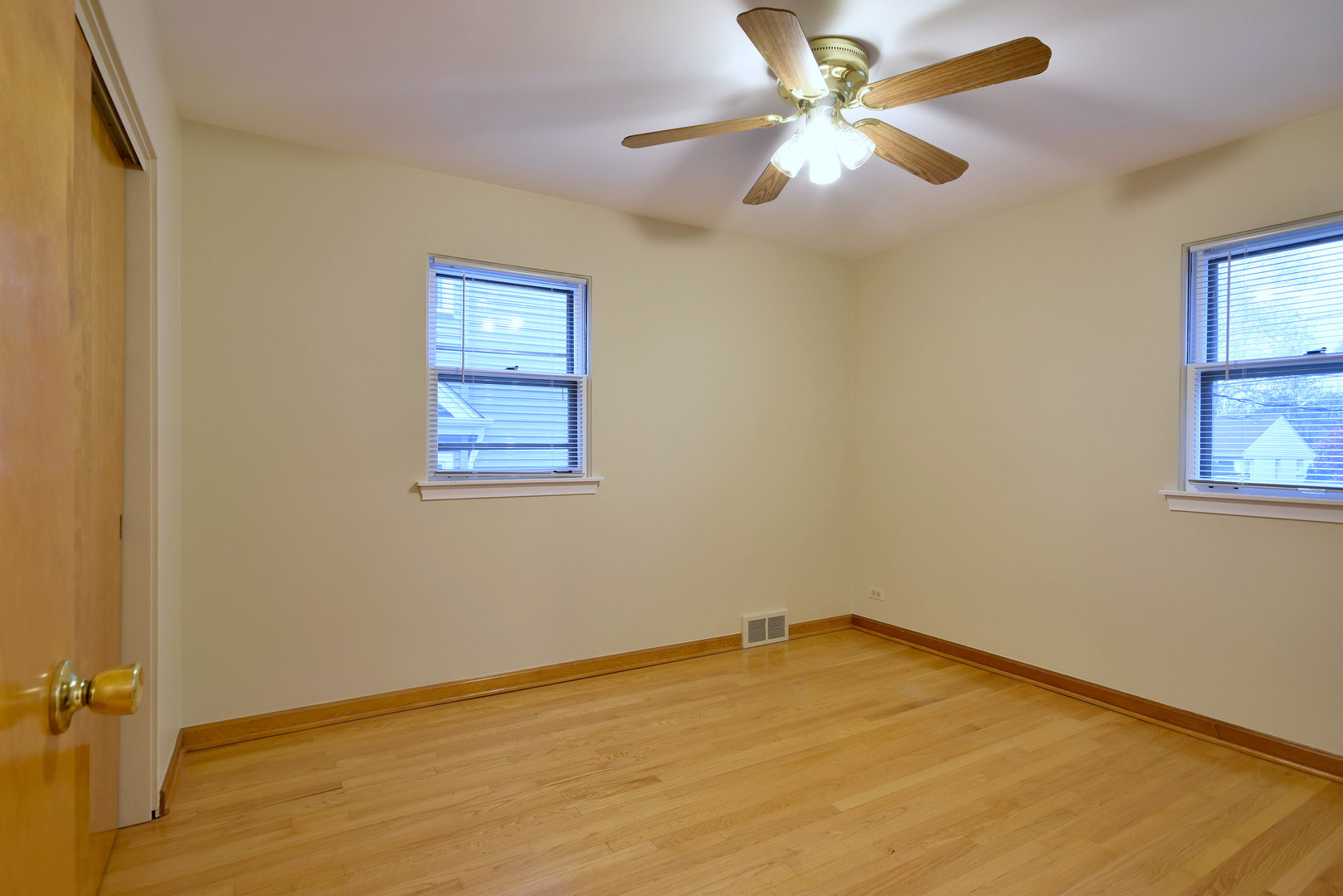 632 Bryan Street Elmhurst, IL 60126 - Photo 12 of 33 an empty room with a window and a fan