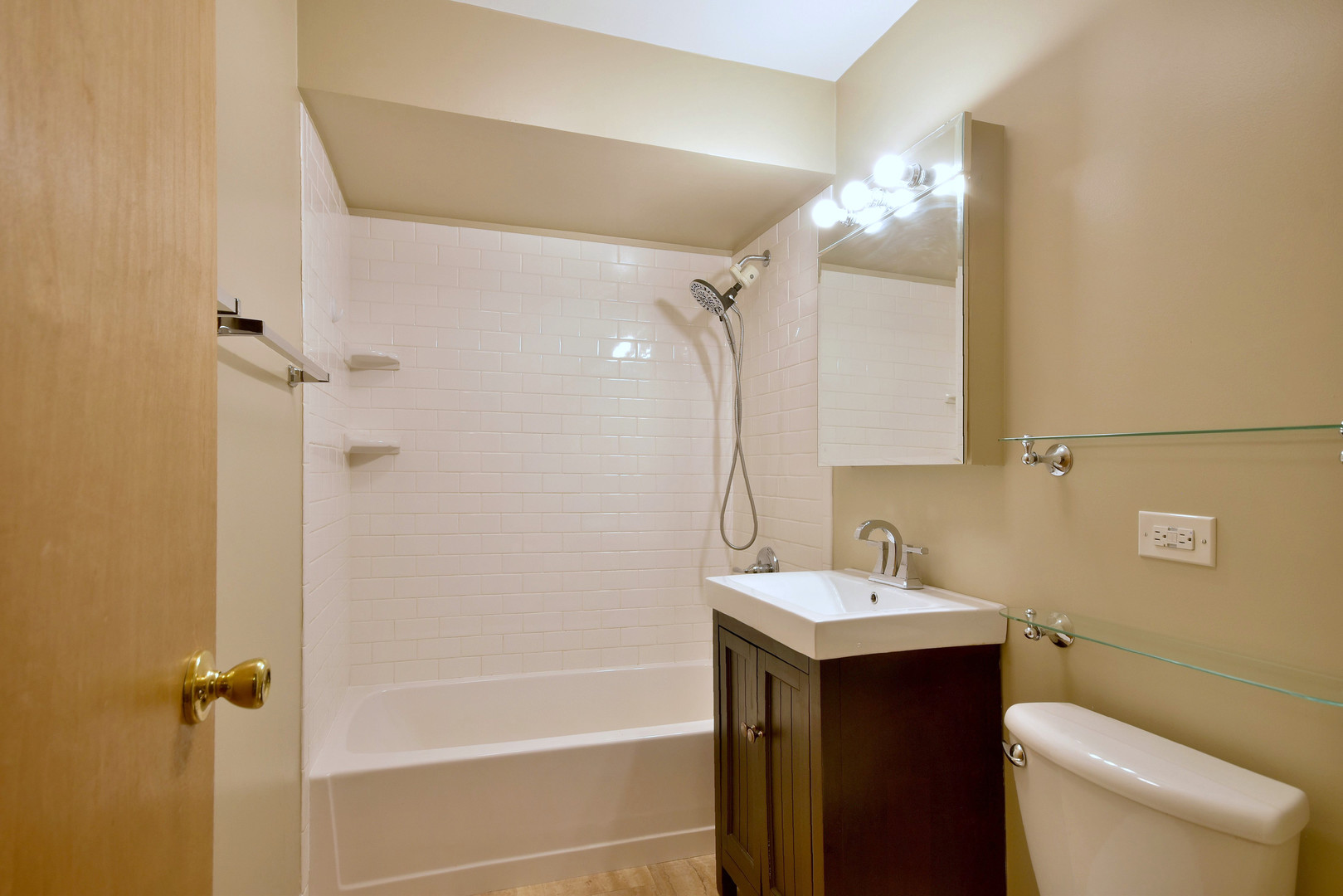 632 Bryan Street Elmhurst, IL 60126 - Photo 15 of 33 a bathroom with a sink toilet and shower
