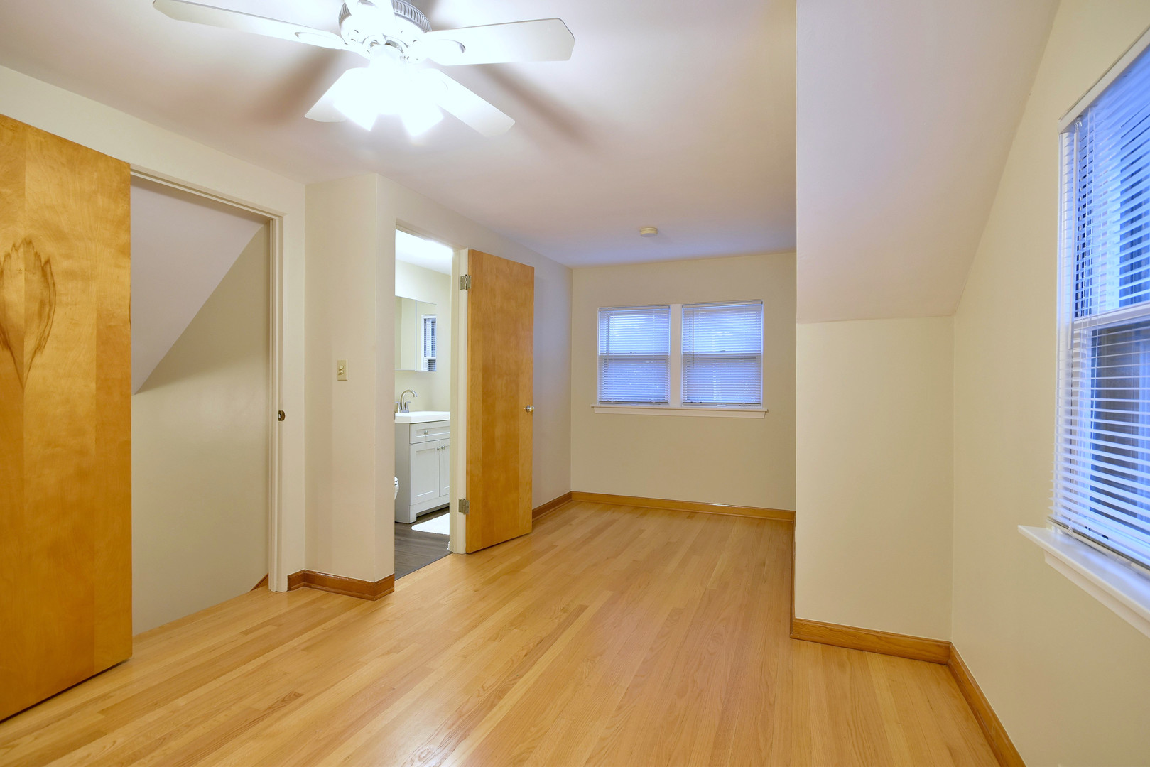 632 Bryan Street Elmhurst, IL 60126 - Photo 18 of 33 wooden floor in an empty room with a window