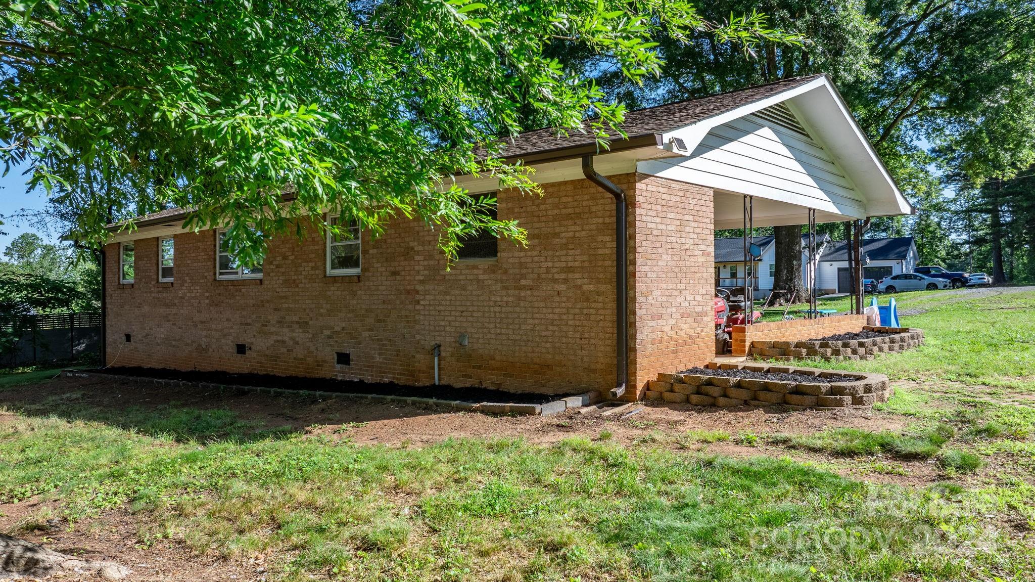 1675 Morningside Drive Newton, NC 28658 - Photo 23 of 36 front view of a house with a yard
