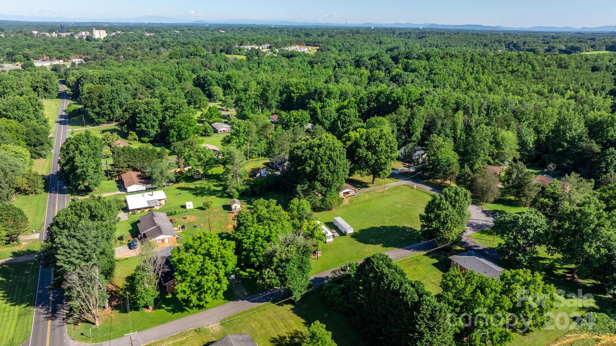 1675 Morningside Drive Newton, NC 28658 - Photo 34 of 36 an aerial view of a residential houses with outdoor space and trees