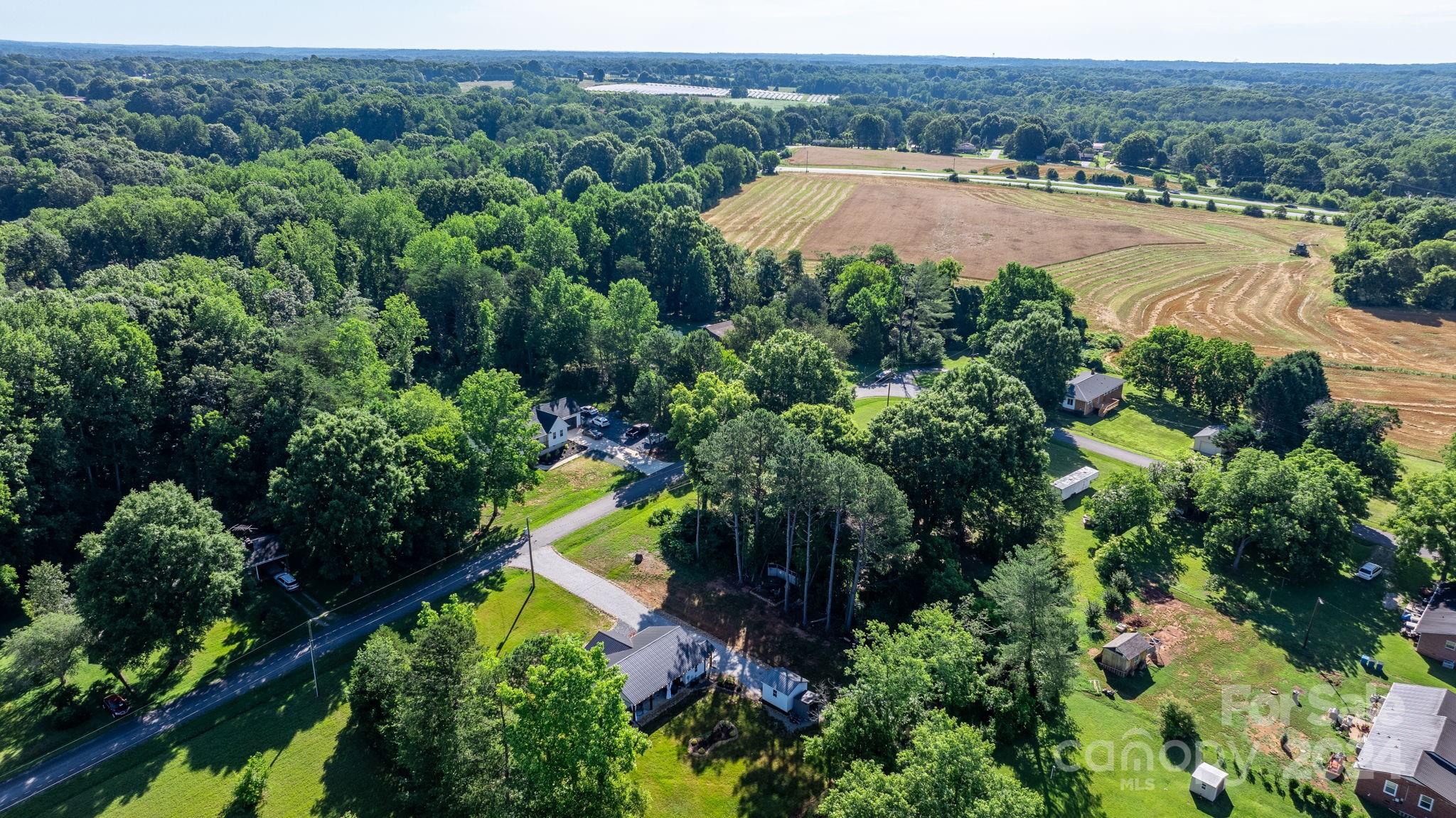 1675 Morningside Drive Newton, NC 28658 - Photo 35 of 36 an aerial view of residential houses with outdoor space and trees all around