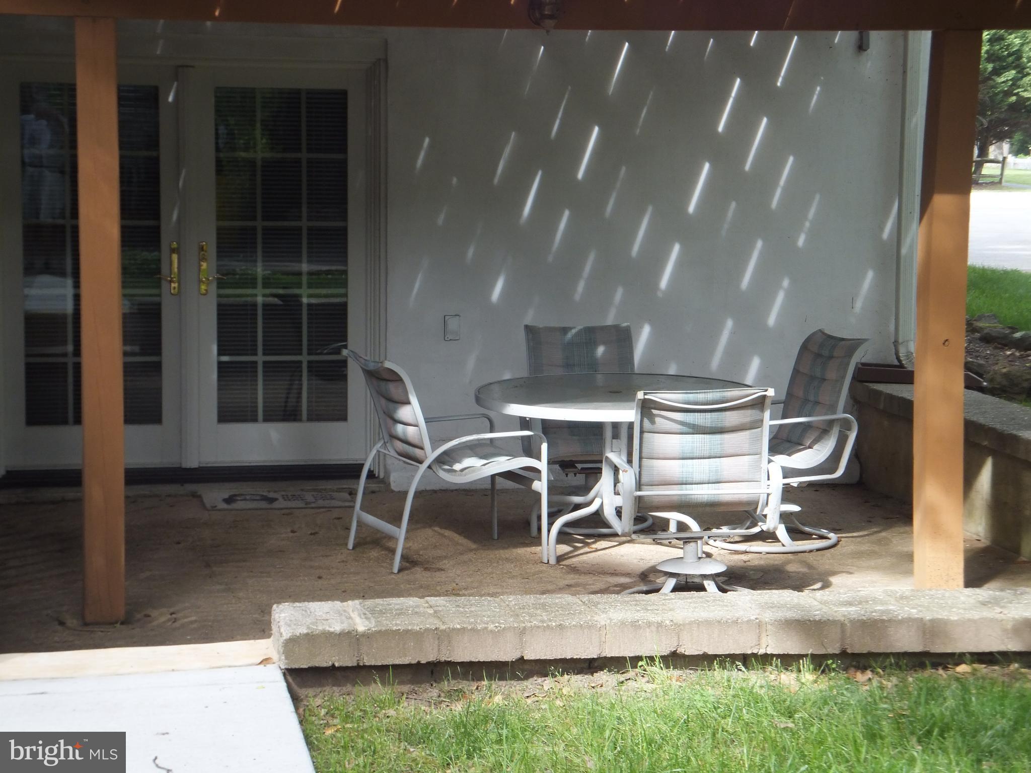 206 Eastern Road Pasadena, MD 21122 - Photo 11 of 57 PATIO OFF LOWER LEVEL w/ NEWER FRENCH DOORS