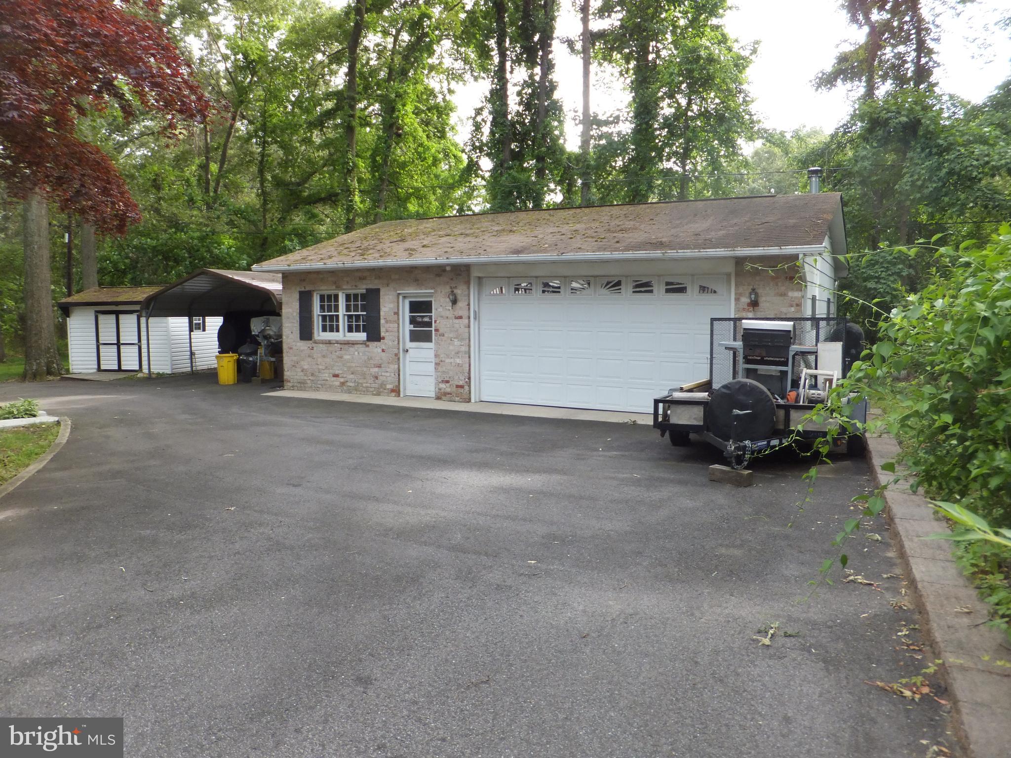 206 Eastern Road Pasadena, MD 21122 - Photo 7 of 57 OVERSIZED 2 + CAR HEATED GARAGE w/LARGE WORKSHOP
