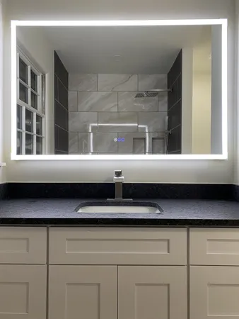 a bedroom with double bed and a window