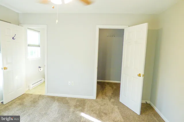 a view of a hallway with painted walls