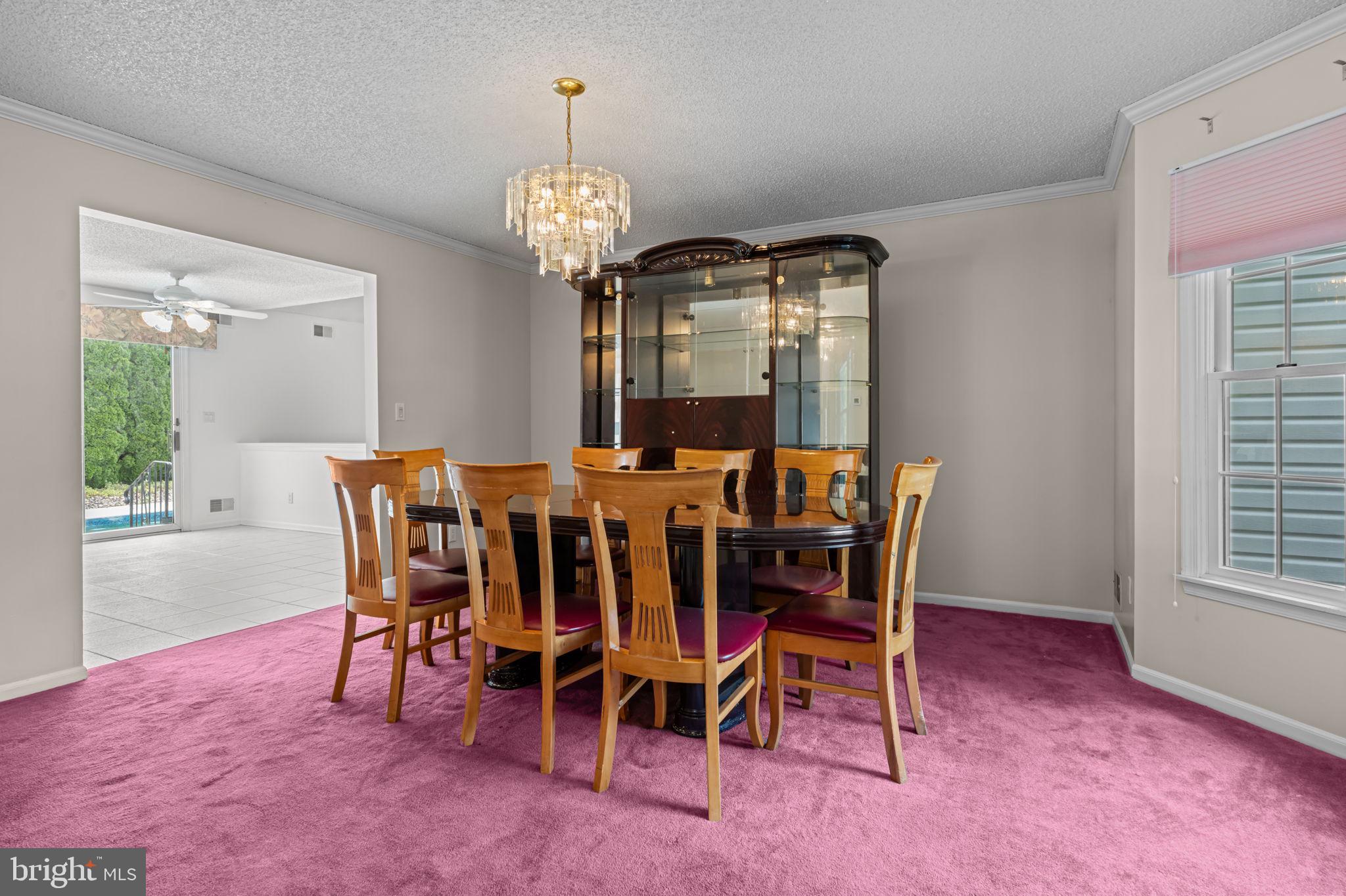 18 Lea Drive Hamilton, NJ 08690 - Photo 13 of 44 a view of a dining room with furniture and chandelier