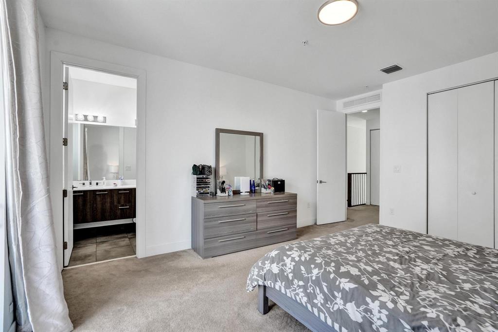 480 Northeast 35th Court, Unit 2 Oakland Park, FL 33334 - Photo 13 of 35 a bedroom with a bed and a dresser