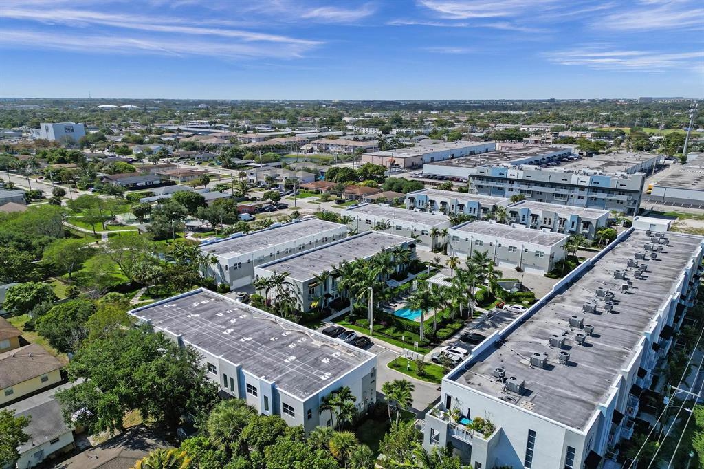 480 Northeast 35th Court, Unit 2 Oakland Park, FL 33334 - Photo 35 of 35 an aerial view of residential houses with outdoor space