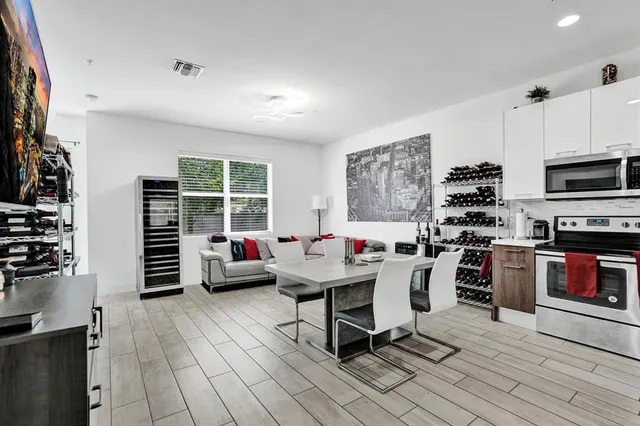 a room with furniture and a flat screen tv