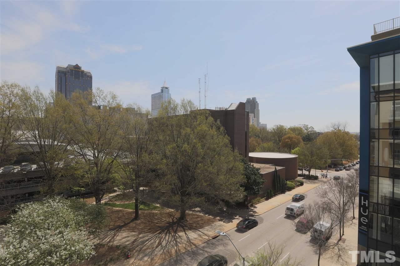 317 West Morgan Street, Unit 412 Raleigh, NC 27601 - Photo 23 of 25 a view of a city with tall trees