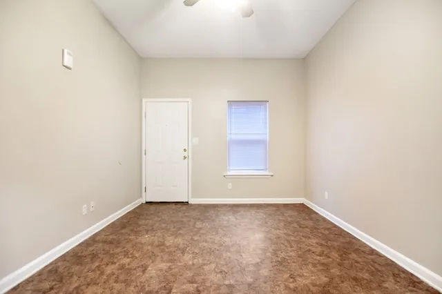 an empty room with a window