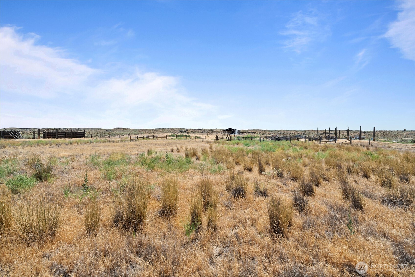 14371 Spirit Valley Road Northeast Moses Lake, WA 98837 - Photo 27 of 39 a view of a lake with houses in the back