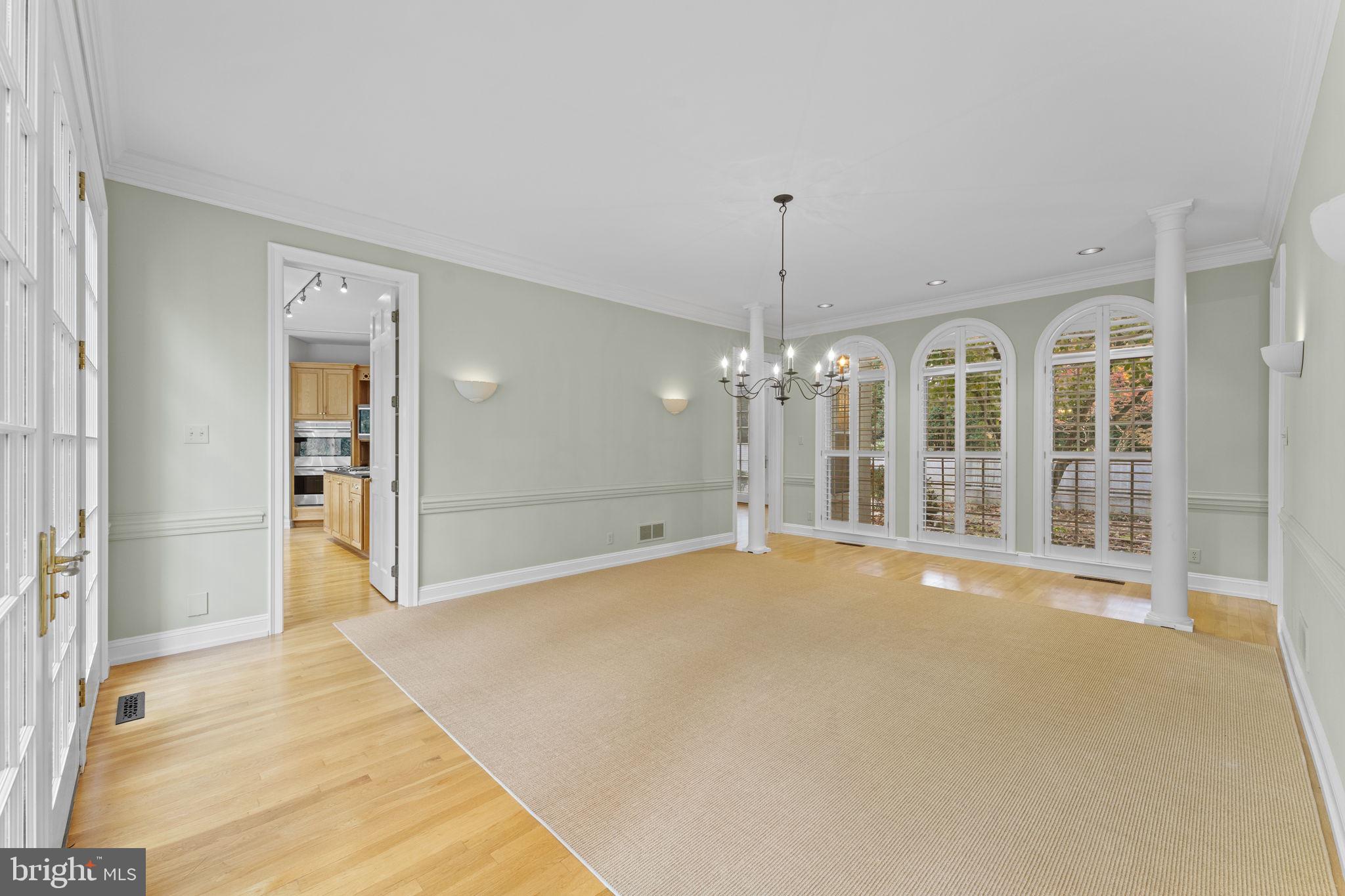 841 Mt Moro Road Villanova, PA 19085 - Photo 11 of 63 a view of an empty room with chandelier and glass door