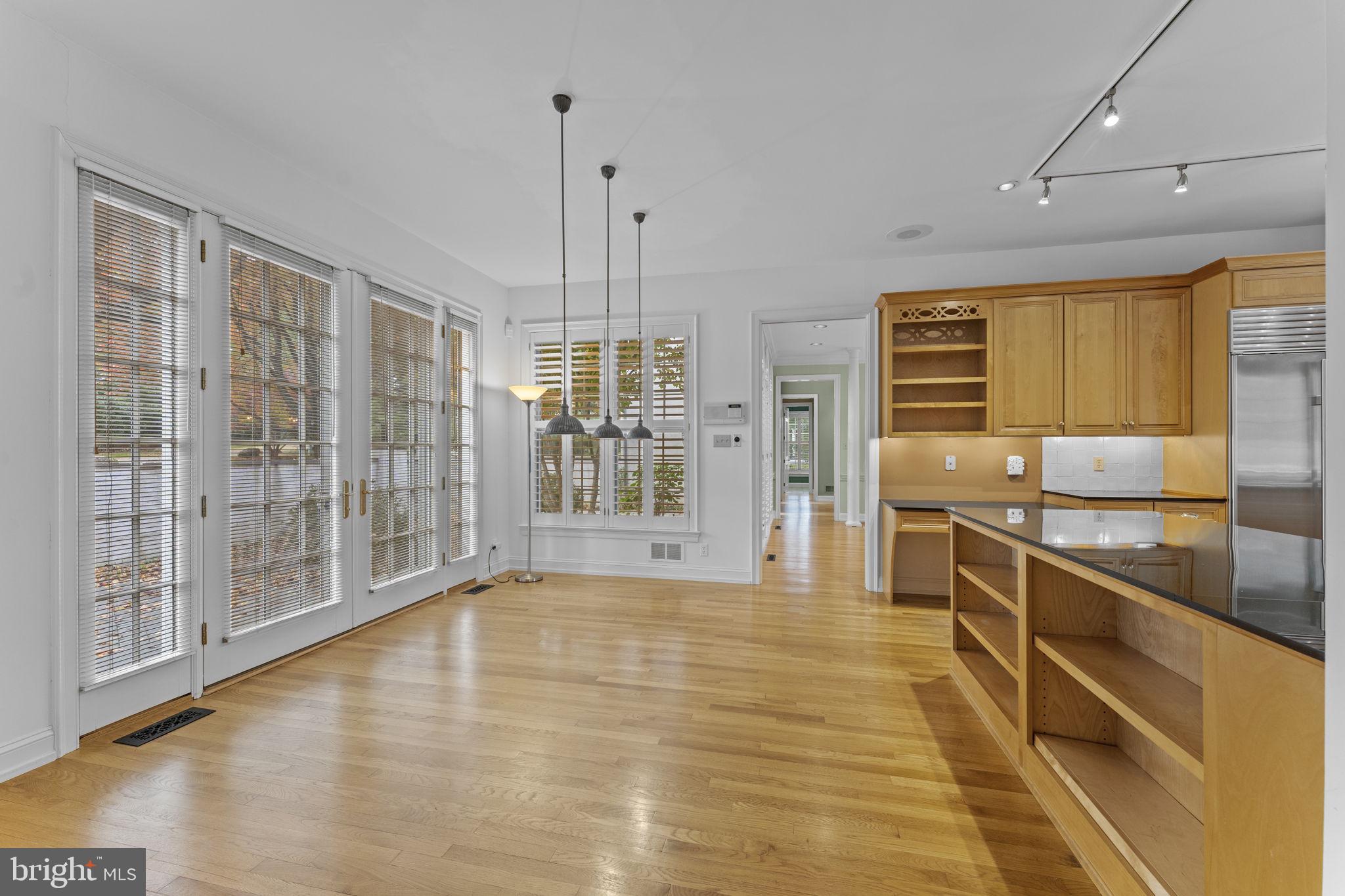 841 Mt Moro Road Villanova, PA 19085 - Photo 15 of 63 a large kitchen with stainless steel appliances granite countertop a granite counter tops and a large window