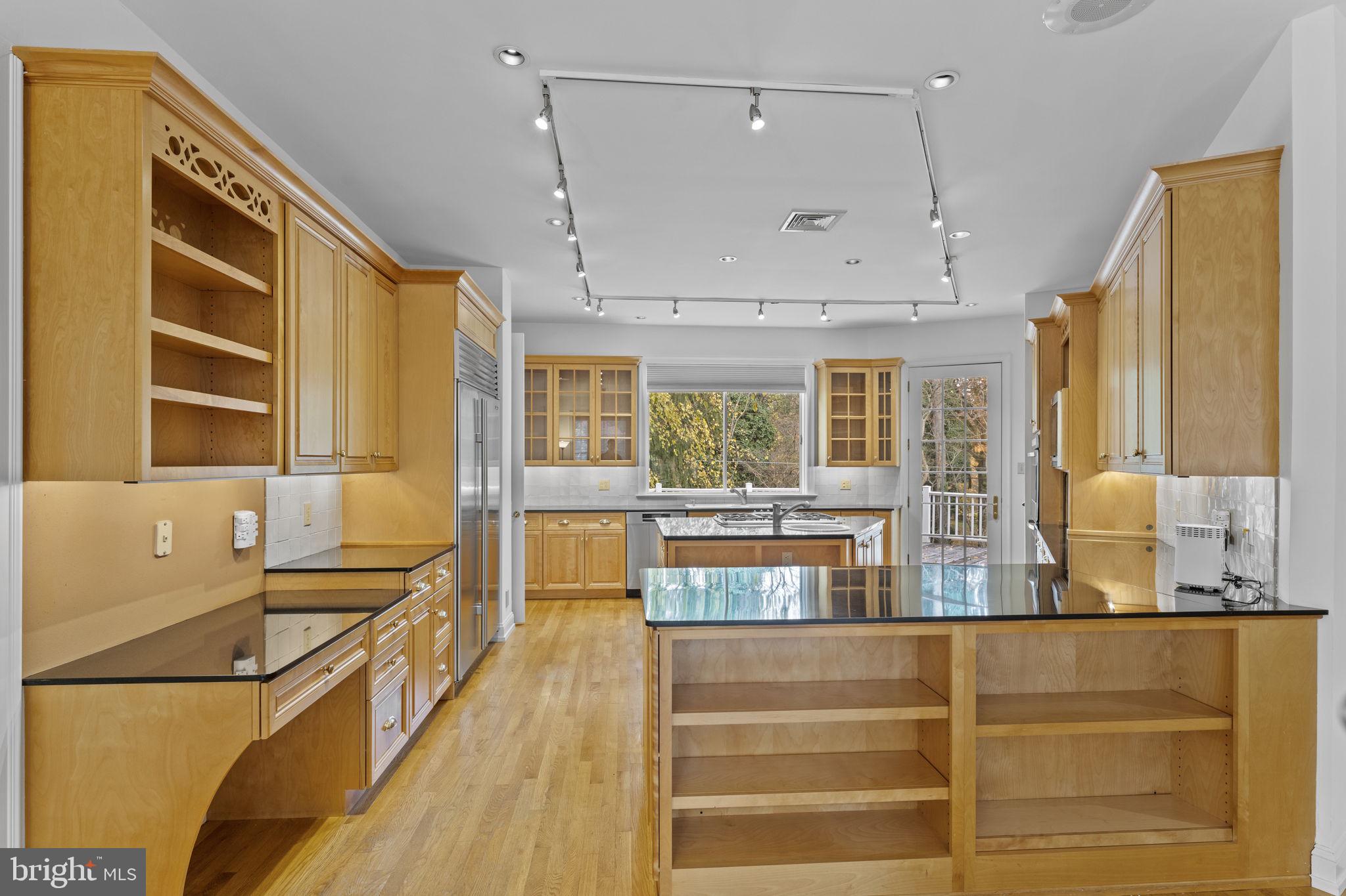 841 Mt Moro Road Villanova, PA 19085 - Photo 16 of 63 a spacious bathroom with a double vanity sink a mirror and a shower